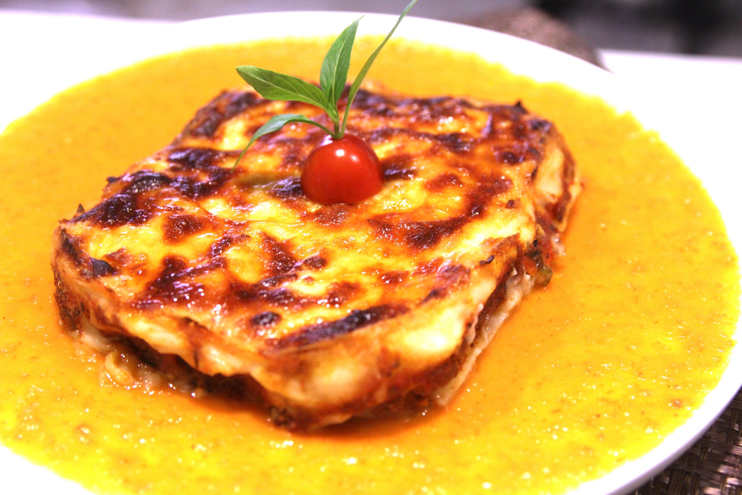 Chicken mushroom truffle lasagna with tomato sauce