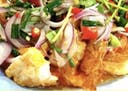 Spicy salad with fried egg