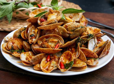 Stir fry flower clam with thai chilli paste 