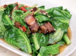 Stir fry Kai lan with crispy pork